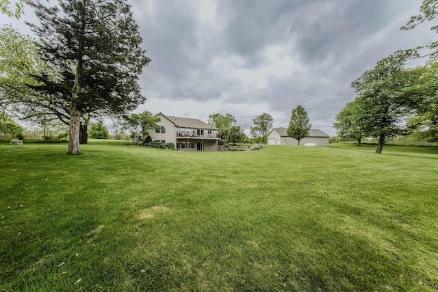2210 Lindsey Rd, Jackson, MI 49201 - view of green lawn with a wooden deck