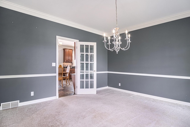 7340 Royal Ridge Dr SE, Caledonia, MI 49316 - carpeted empty room with a chandelier, crown molding, and baseboards