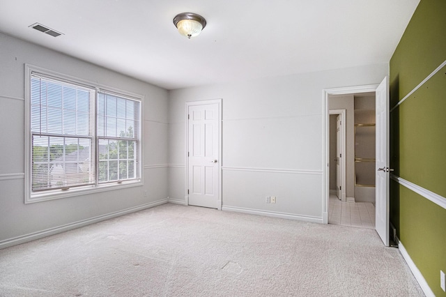 7340 Royal Ridge Dr SE, Caledonia, MI 49316 - unfurnished bedroom featuring carpet, baseboards, and a closet