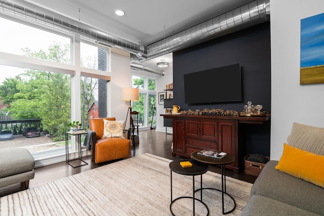 211 W Kingsley St, Ann Arbor, MI 48103 - living area featuring wood finished floors and a towering ceiling