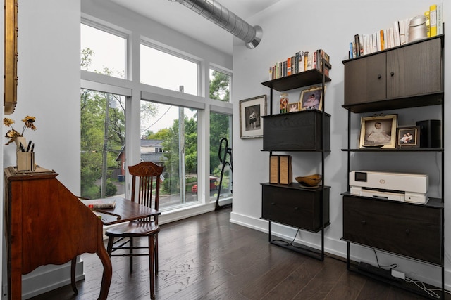 211 W Kingsley St, Ann Arbor, MI 48103 - office space featuring dark wood-style flooring and a towering ceiling