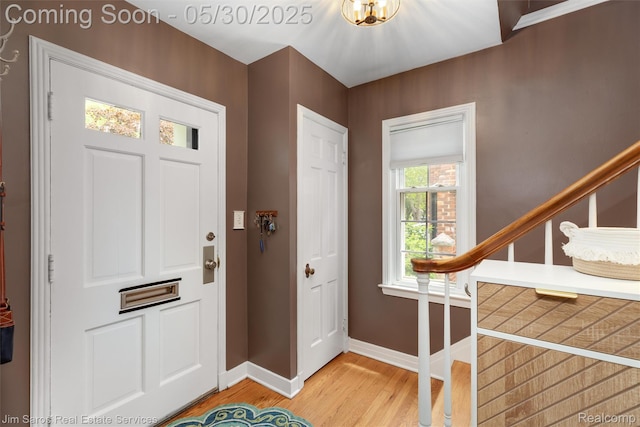 441 Mckinley Ave, Grosse Pointe Farms, MI 48236 - foyer featuring light wood-style floors, baseboards, and stairway
