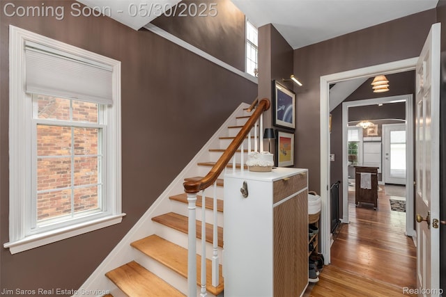 441 Mckinley Ave, Grosse Pointe Farms, MI 48236 - staircase with plenty of natural light and wood finished floors
