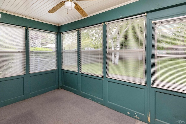 1202 Avalon Ave, Saginaw, MI 48638 - unfurnished sunroom with ceiling fan, a decorative wall, carpet, and plenty of natural light