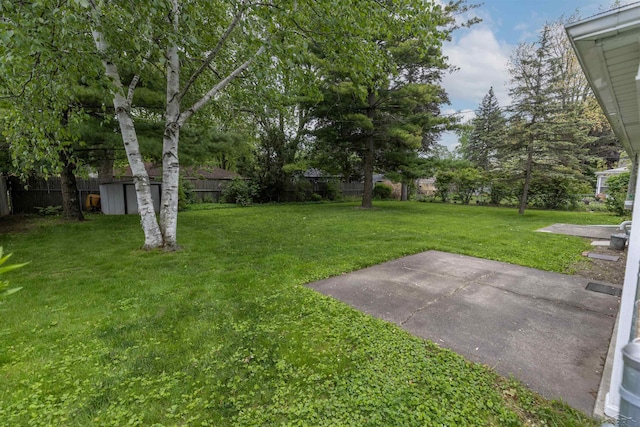 1202 Avalon Ave, Saginaw, MI 48638 - view of yard featuring a patio area