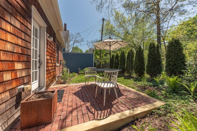 511 W Jefferson St, Ann Arbor, MI 48103 - wooden deck featuring a patio and outdoor dining area