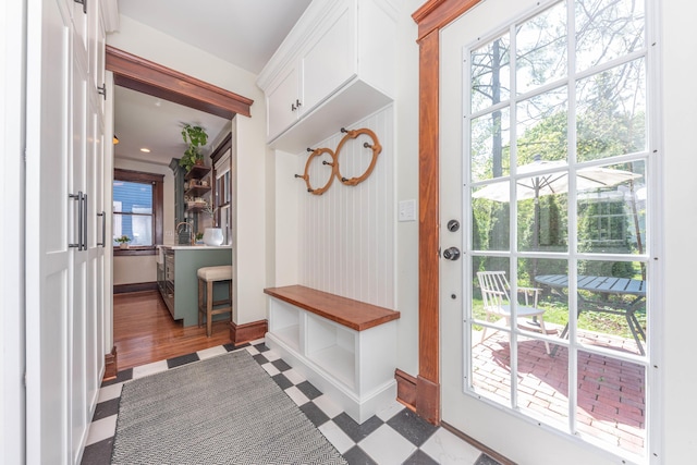 511 W Jefferson St, Ann Arbor, MI 48103 - mudroom with tile patterned floors and baseboards