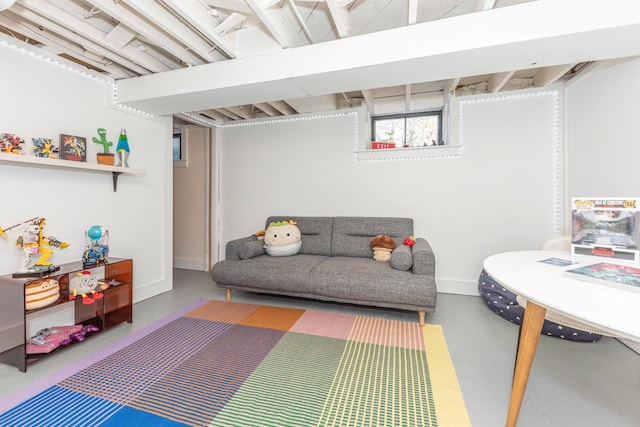 511 W Jefferson St, Ann Arbor, MI 48103 - living room with concrete flooring and baseboards