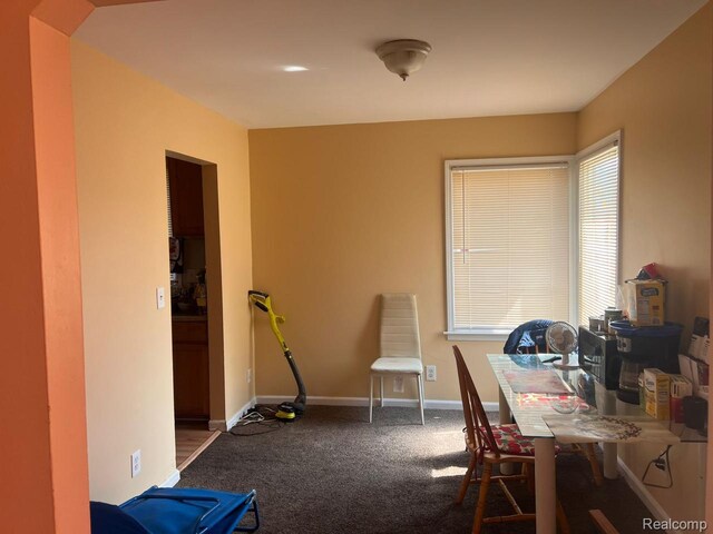 9910 Coyle St, Detroit, MI 48227 - carpeted home office featuring baseboards