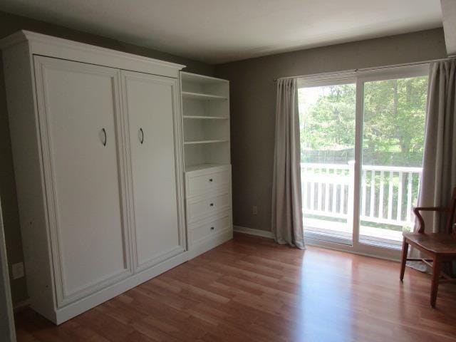 2024 Hamilton St, Okemos, MI 48864 - living area with light wood-style floors and baseboards