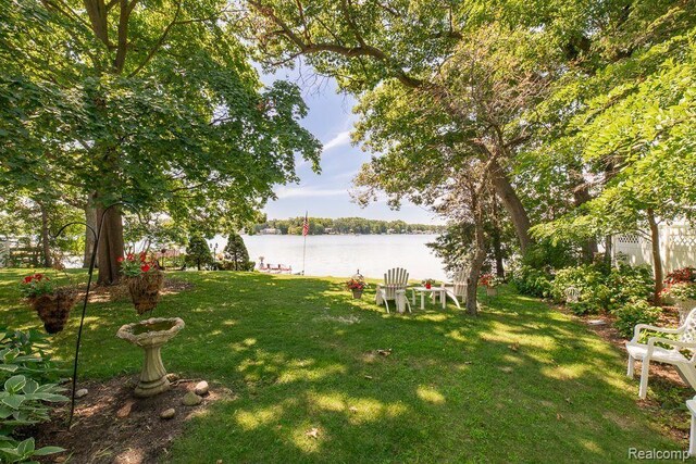1786 Point St, Commerce Twp, MI 48382 - view of grassy yard with a water view