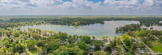 1786 Point St, Commerce Twp, MI 48382 - aerial view of property and surrounding area with a nearby body of water and nearby suburban area