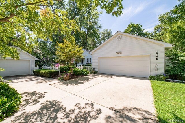 1786 Point St, Commerce Twp, MI 48382 - view of front of home with an outbuilding