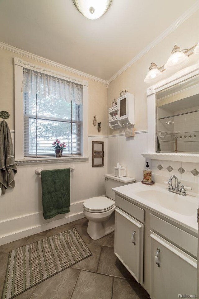 1786 Point St, Commerce Twp, MI 48382 - bathroom featuring crown molding, vanity, and toilet