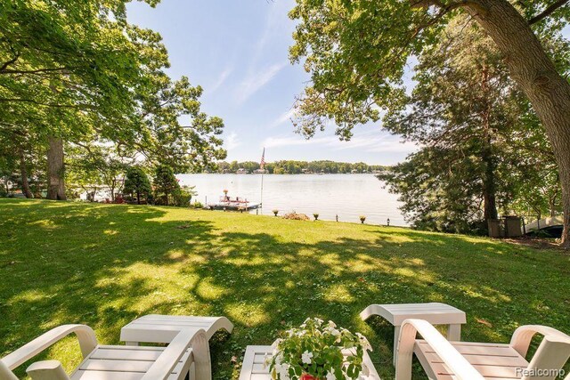 1786 Point St, Commerce Twp, MI 48382 - view of grassy yard with a water view