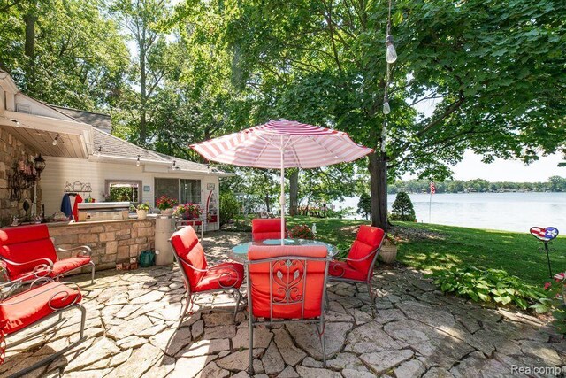 1786 Point St, Commerce Twp, MI 48382 - view of patio / terrace with outdoor dining area and a water view