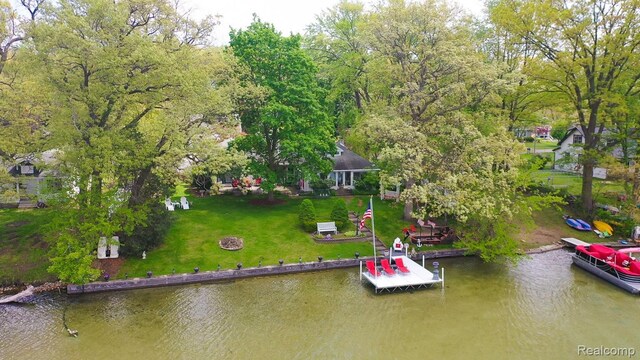 1786 Point St, Commerce Twp, MI 48382 - dock featuring a water view and a lawn