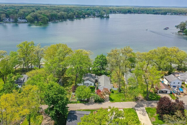 1786 Point St, Commerce Twp, MI 48382 - aerial perspective of suburban area with a nearby body of water and a heavily wooded area