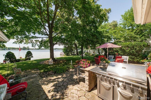 1786 Point St, Commerce Twp, MI 48382 - view of patio featuring a water view and area for grilling