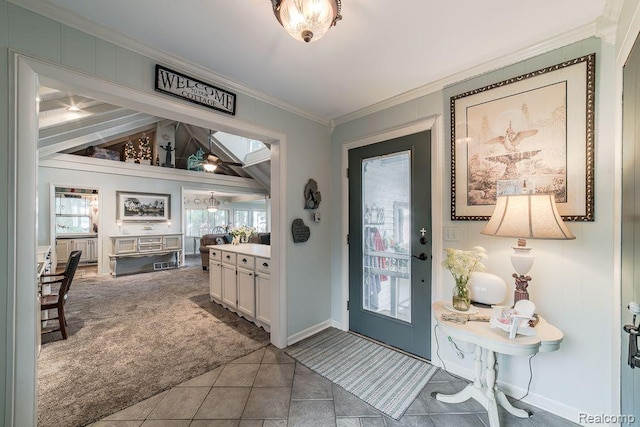 1786 Point St, Commerce Twp, MI 48382 - foyer entrance with ornamental molding, carpet, plenty of natural light, baseboards, and tile patterned floors