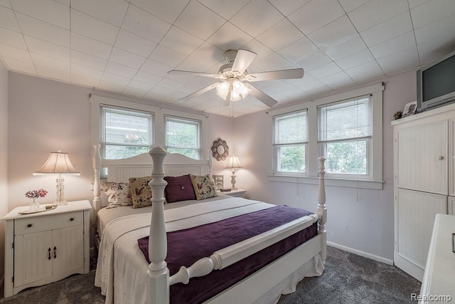 1786 Point St, Commerce Twp, MI 48382 - bedroom with multiple windows, dark colored carpet, a ceiling fan, and baseboards