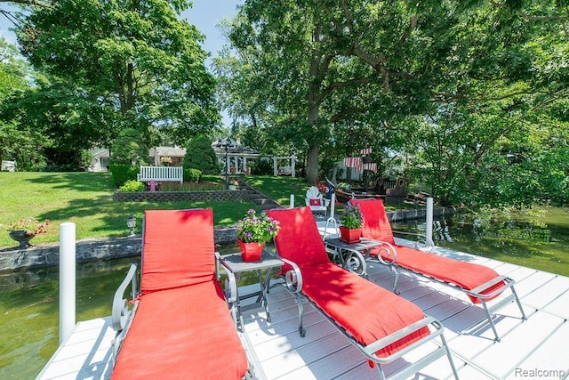1786 Point St, Commerce Twp, MI 48382 - dock with a lawn and view of scattered trees