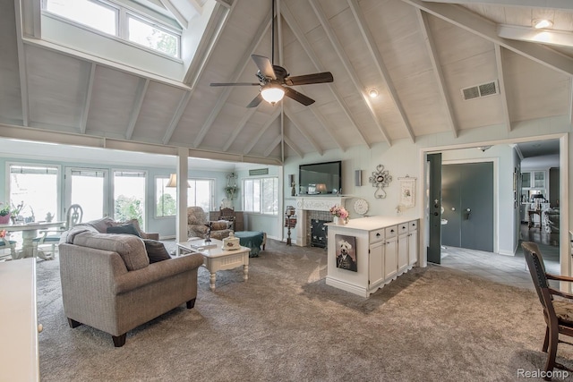 1786 Point St, Commerce Twp, MI 48382 - carpeted living area with high vaulted ceiling, ceiling fan, a fireplace, and beamed ceiling