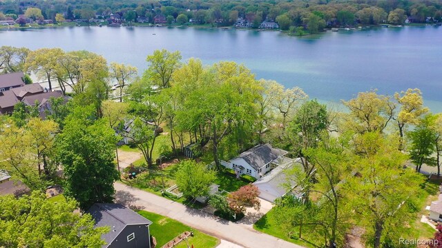 1786 Point St, Commerce Twp, MI 48382 - aerial perspective of suburban area featuring a large body of water