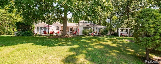 1786 Point St, Commerce Twp, MI 48382 - view of grassy yard with a pergola