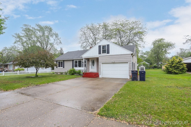 100 E 35th St, Holland, MI 49423 - view of front of house with a garage, driveway, and roof with shingles
