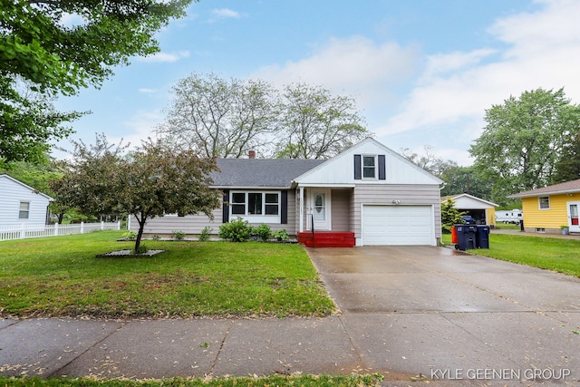 100 E 35th St, Holland, MI 49423 - view of front of house with an attached garage, driveway, roof with shingles, and a chimney