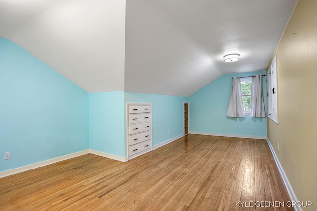100 E 35th St, Holland, MI 49423 - bonus room featuring light wood finished floors, lofted ceiling, and baseboards