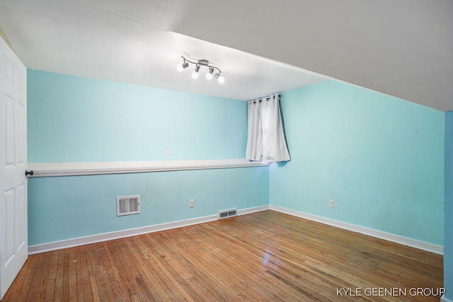 100 E 35th St, Holland, MI 49423 - additional living space featuring wood-type flooring and baseboards