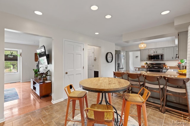 431 Meadowbrook Dr, Adrian, MI 49221 - dining room featuring recessed lighting and baseboards