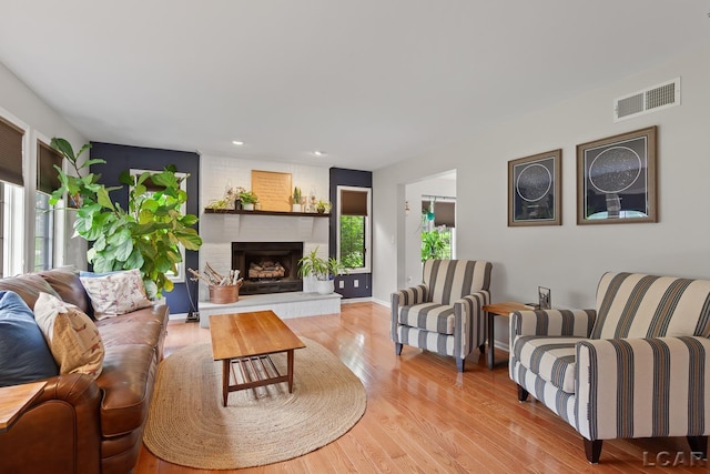 431 Meadowbrook Dr, Adrian, MI 49221 - living area featuring light wood-style flooring, recessed lighting, and a fireplace