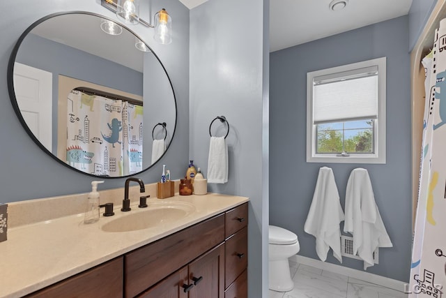 431 Meadowbrook Dr, Adrian, MI 49221 - full bath featuring marble look tile flooring, vanity, toilet, and baseboards