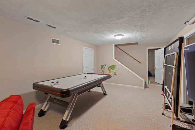 431 Meadowbrook Dr, Adrian, MI 49221 - playroom with carpet floors, baseboards, and a textured ceiling