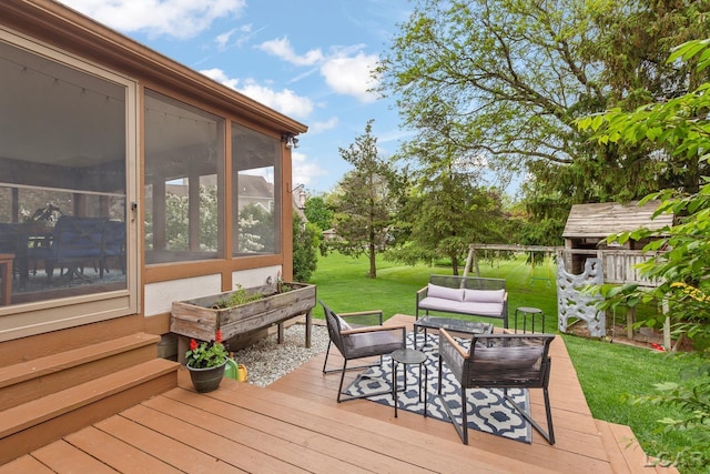 431 Meadowbrook Dr, Adrian, MI 49221 - wooden terrace featuring an outdoor hangout area, a lawn, and a sunroom