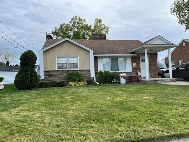 1784 Sherwood Ct, Dearborn, MI 48124 - view of front of property with a chimney, a front yard, roof with shingles, board and batten siding, and stone siding