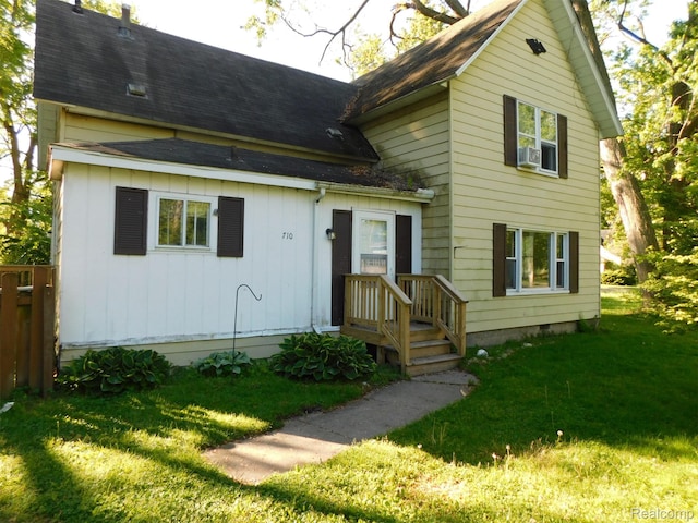 710 Washington St, Algonac, MI 48001 - view of front facade featuring roof with shingles and board and batten siding