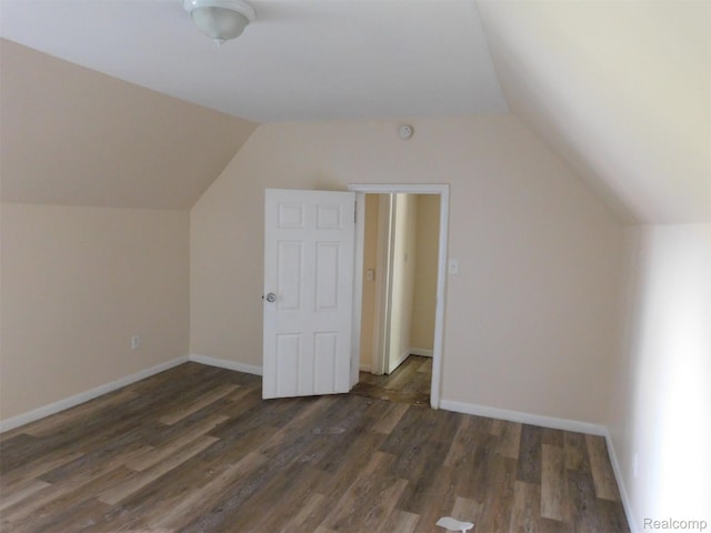 710 Washington St, Algonac, MI 48001 - bonus room featuring vaulted ceiling, wood finished floors, and baseboards