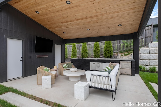 421 Manhattan Rd SE, Grand Rapids, MI 49506 - view of patio featuring an outdoor living space and a sink