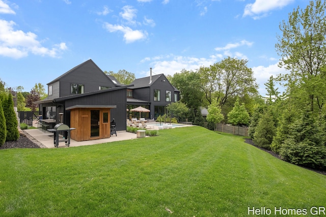 421 Manhattan Rd SE, Grand Rapids, MI 49506 - rear view of property featuring a patio