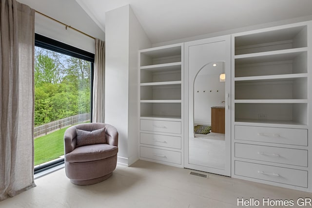 421 Manhattan Rd SE, Grand Rapids, MI 49506 - sitting room with built in shelves and vaulted ceiling