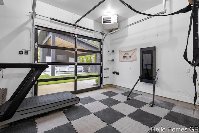 421 Manhattan Rd SE, Grand Rapids, MI 49506 - exercise room featuring baseboards and a heating unit