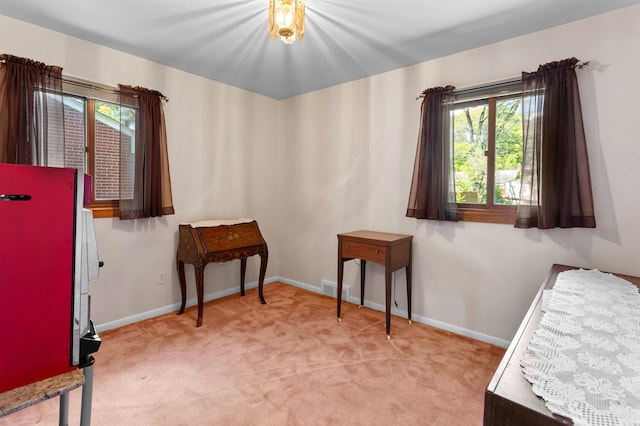 9085 Brentwood St, Livonia, MI 48150 - bedroom featuring multiple windows, light carpet, and baseboards