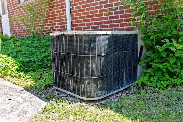 9085 Brentwood St, Livonia, MI 48150 - exterior view of cooling unit and brick siding