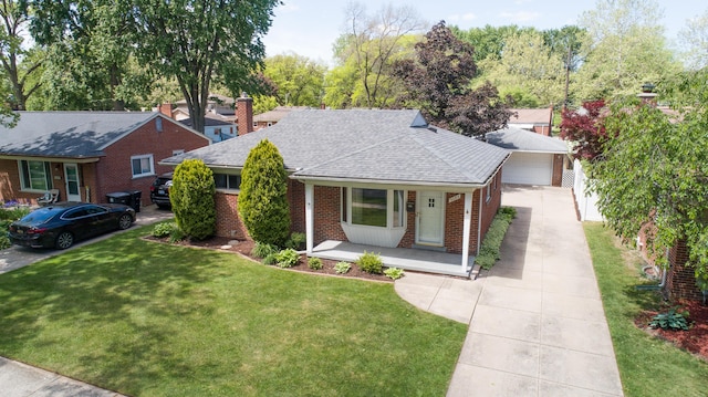 9085 Brentwood St, Livonia, MI 48150 - view of front facade with brick siding, a porch, roof with shingles, and a front lawn