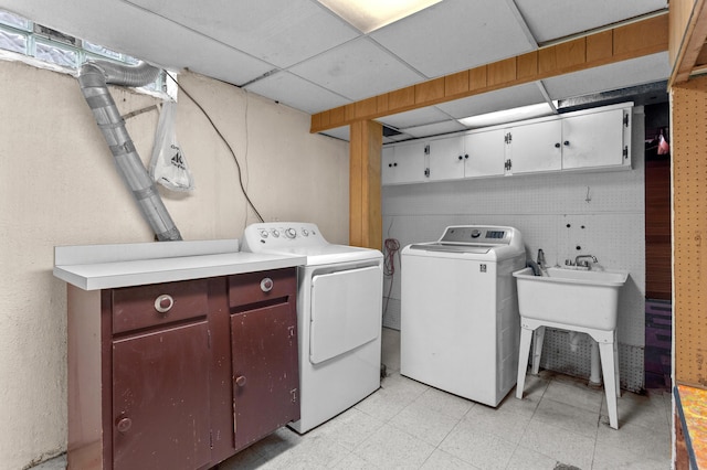 9085 Brentwood St, Livonia, MI 48150 - laundry room with cabinet space, washer and clothes dryer, and light flooring