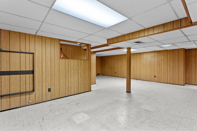 9085 Brentwood St, Livonia, MI 48150 - finished basement with a drop ceiling and wood walls